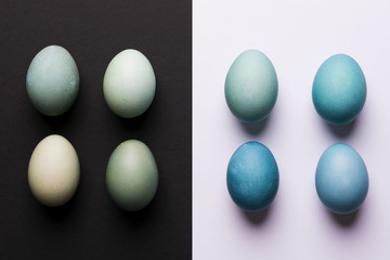 Happy Easter black and white background. Hand painted blue Easter eggs abstract minimal concept.