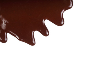 Melted chocolate dripping isolated on white background