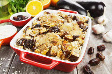 Chicken thigh baked with rice, eggplant and figs