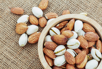 Almond in wooden bowl.