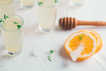 Alcohol shots with lemon liquor. Limoncello in glass shots.