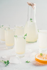 Alcohol shots with lemon liquor. Limoncello in glass shots.