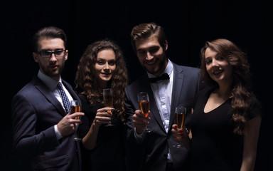 company fashionable friends ,with a glass of wine