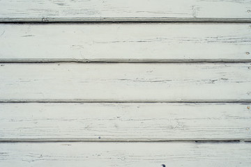 Wooden beautiful background - an empty surface of painted in light tone boards