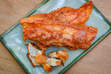 Fried streaky pork, style thai food.