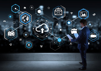 Businessman watching social network interface on a rooftop 3D rendering