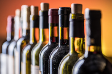 Line of wine bottles. Close-up.