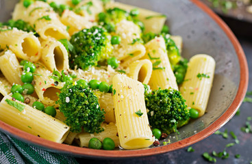 Pasta rigatoni with broccoli and green peas. Vegan menu. Dietary food