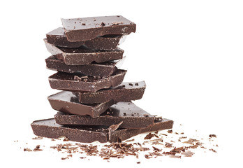 Pile of broken chocolate bar on a white background