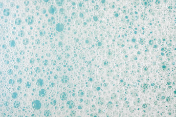 Abstract background white soapy foam texture. Shampoo foam with bubbles