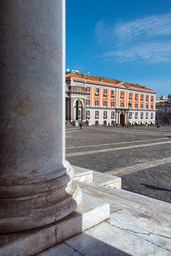Naples (Italy) - Piazza Plebiscito, the main square in the historic centre of Naples. Prefecture Palace seen by the colonnade of the church of San Francesco di Paola