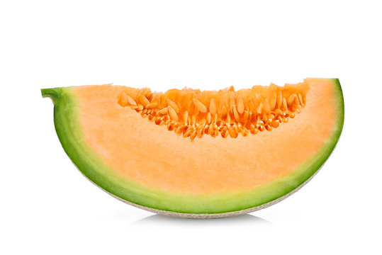 sliced japanese melons, green melon or cantaloupe melon with seeds isolated on white background