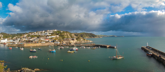 Mevagissey harbour in England with fishing boats