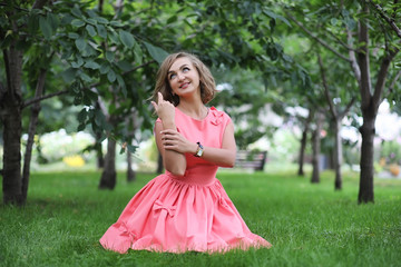 Beautiful girl in the summer park