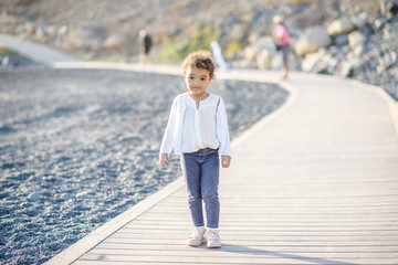 Happy girl enjoying in the Playground