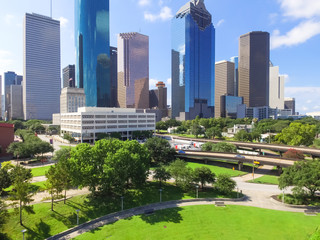 Fototapeta premium Aerial view Houston downtown and Gulf Freeway (highway I45). Daytime cityscape with cloud blue sky.