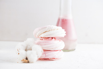 aspberry meringue on concrete desk. Space for text. Close up view. Romatic wedding.