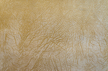 Texture of beige upholstery fabric.