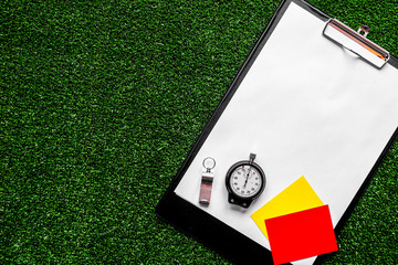 concept refereeing sport on green background top view mock up