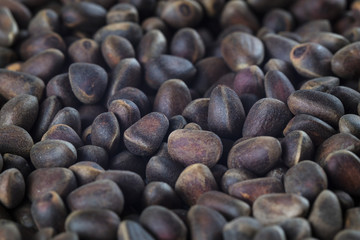 pine nuts on the table close - up with inscriptions