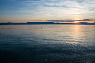 Naklejka premium Sunset over the sea