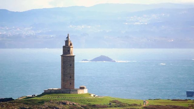 Aviva luxury super yacht sailing near the Tower of Hercules on Coruña city , hd video footage