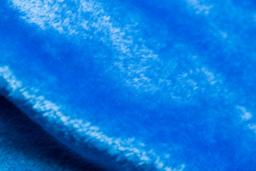 Fototapeta na wymiar Soft blue fabric blanket for sweet sleeping