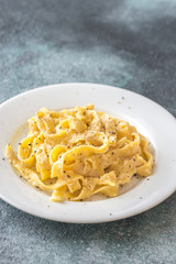 Portion of fettuccine Alfredo