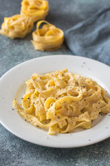 Portion of fettuccine Alfredo
