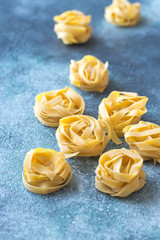 Raw fettuccine pasta