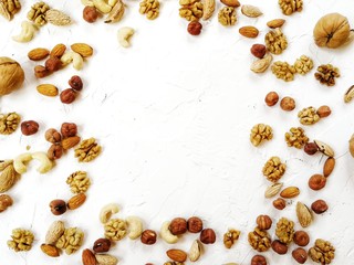 different nuts, peeled and in-shell