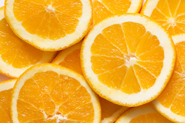 Fresh, juicy slices of orange. Orange fruit background 