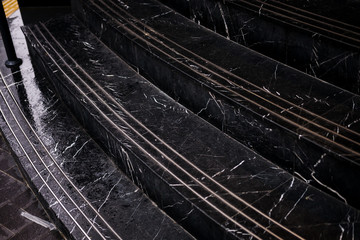 Naklejka na ściany i meble Black marble stair pattern. Closeup details