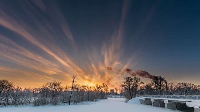 Dobrush, Gomel Region, Belarus. Time Lapse Timelapse Time-lapse Of Old Paper Factory Tower In Winter Morning. Sun In Sunrise Over Historical Heritage