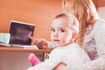 Baby with mom on work