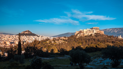 The Parthenon Temple at the Acropolis of Athens during colorful sunset, Greece