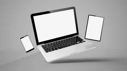 Fototapeta premium flying tablet, laptop and mobile phone