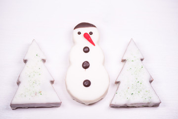 Traditional celebration festive homemade decorated sweets on wooden background