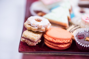 Traditional celebration festive homemade decorated sweets on wooden background