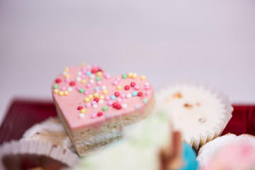 Traditional celebration festive homemade decorated sweets on wooden background