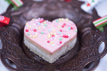 Traditional celebration festive homemade decorated sweets on wooden background
