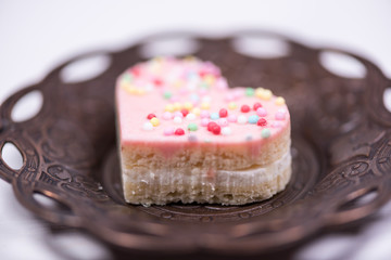 Traditional celebration festive homemade decorated sweets on wooden background