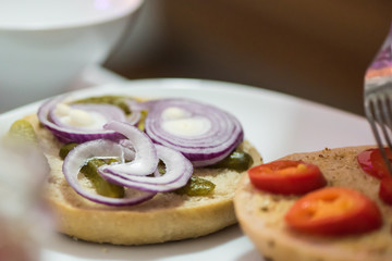 Preparation steps of homemade hamburger with fresh vegetables, spices, cheese and meat