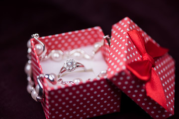Colorful red gift box with ring - valentine gift