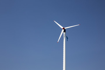 Wind turbine electric, Wind energy turbine, Blue sky.