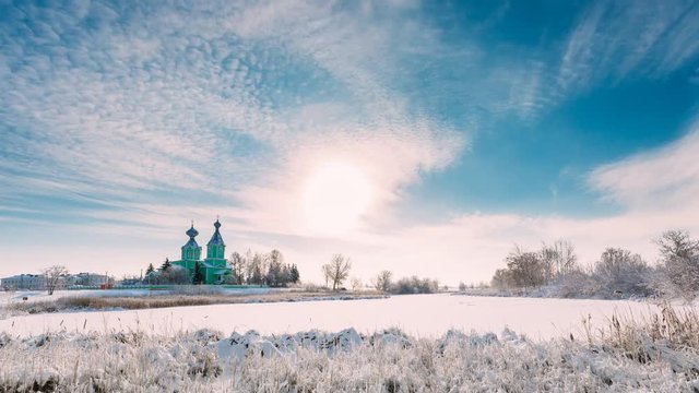 Village Krupets, Dobrush District, Gomel Region, Belarus. Time Lapse Timelapse Time-lapse Of Old Wooden Orthodox Church Of The Holy Trinity Sunny Winter Day. Historical Heritage