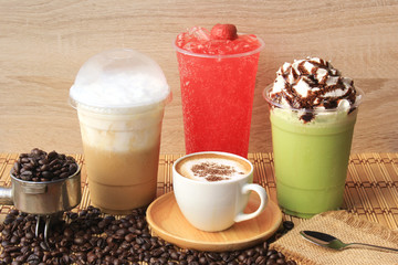 Hot coffee cup with coffee beans on the wooden table, Cold coffee, Iced matcha green tea and fruit...