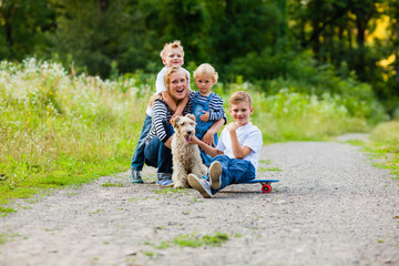 Family with fox terrier dog