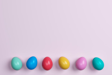 colorful easter eggs and  on pink background.Space for text
