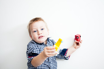 toddler playing with car